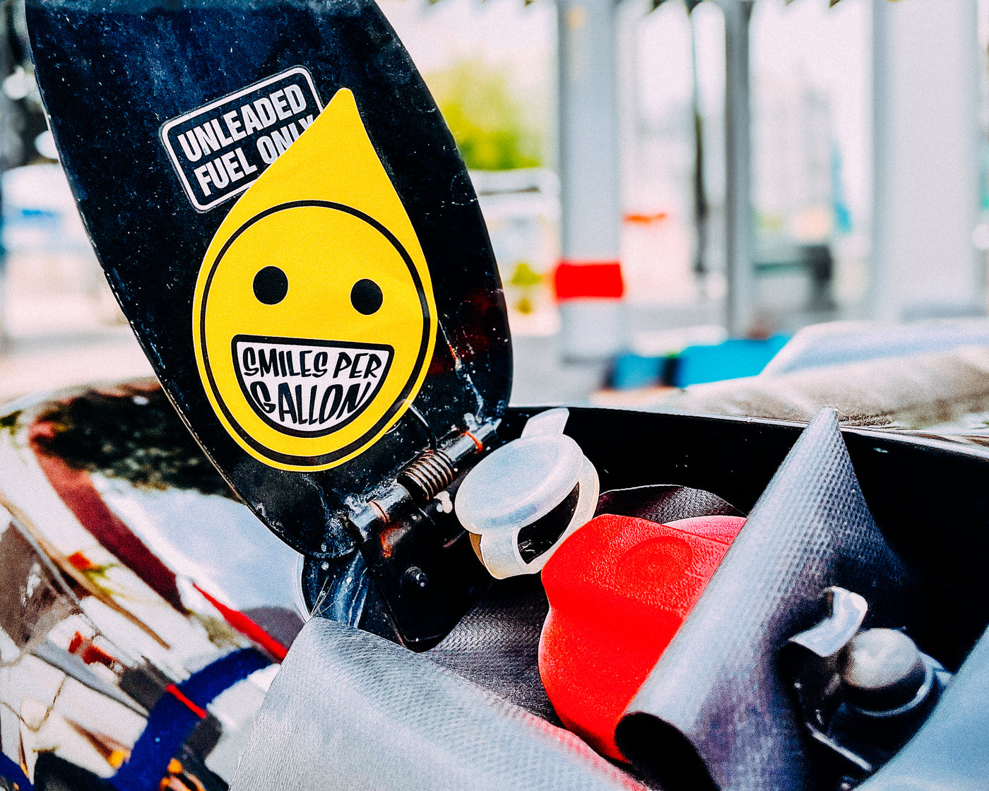 Smiles Per Gallon Sticker